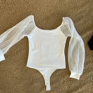 Cute top/ body suit- never worn